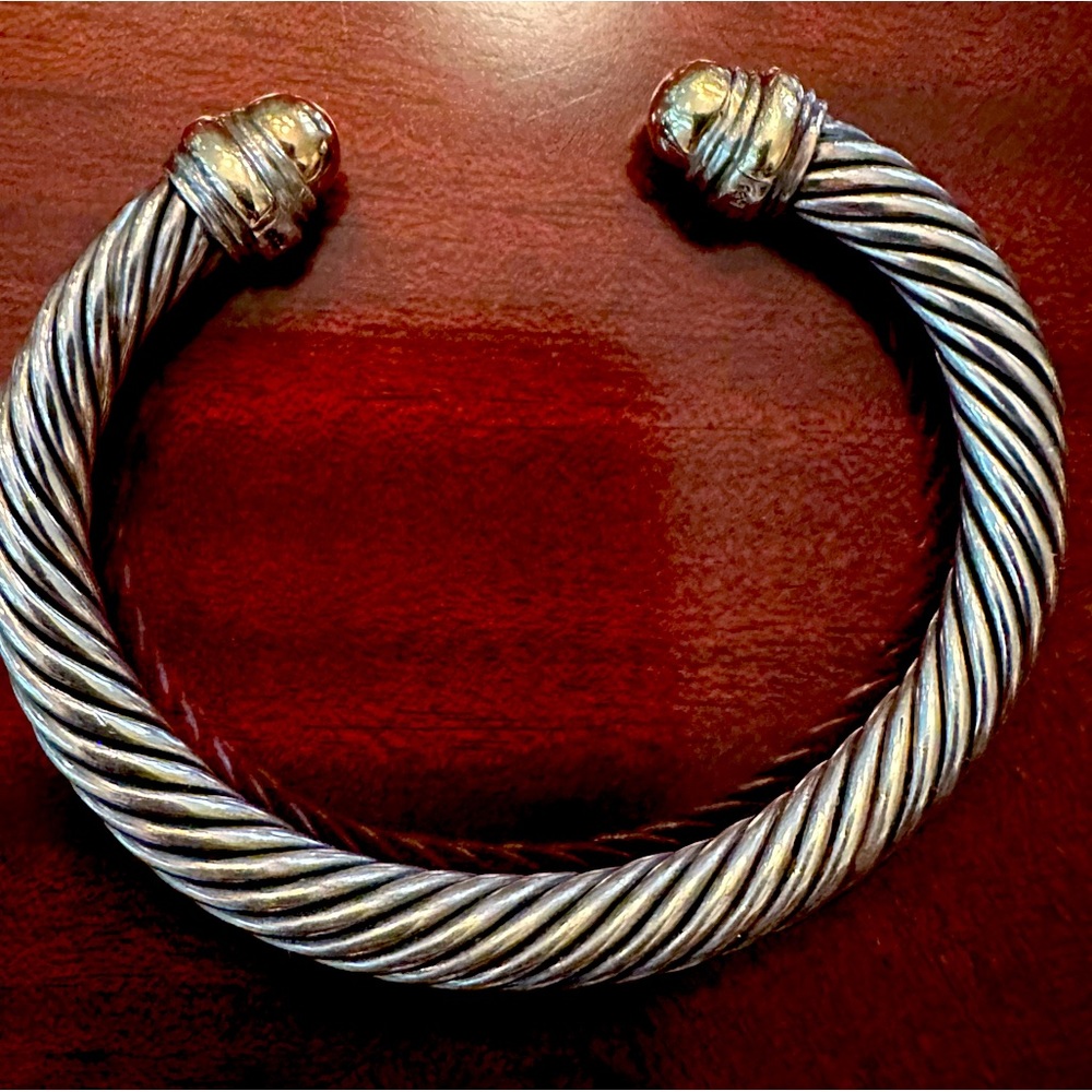 David Yurman’s popular bracelet style in .925 sterling silver w/ 14K accents.